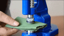 attach jeans buttons by a hand press machine